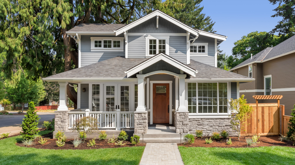 Exterior of home painted gray with white trim